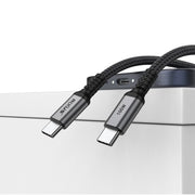 Rixus RXUC04 USB-C 2.0 100W kabel aangesloten op apparaat